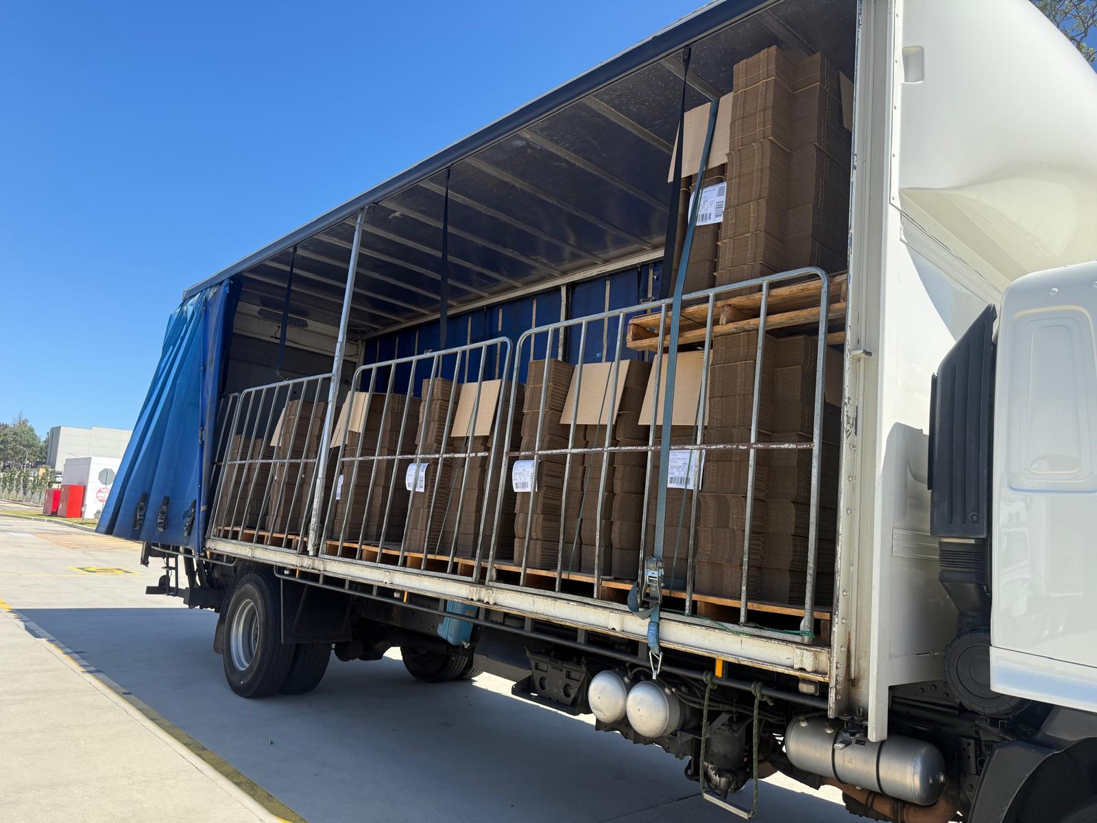 ABS Transport long truck loaded office items to transport in western australia
